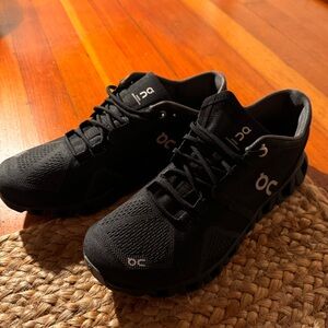 On black Cloud X running shoes